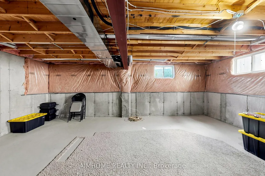 Full unfinished basement with storage space